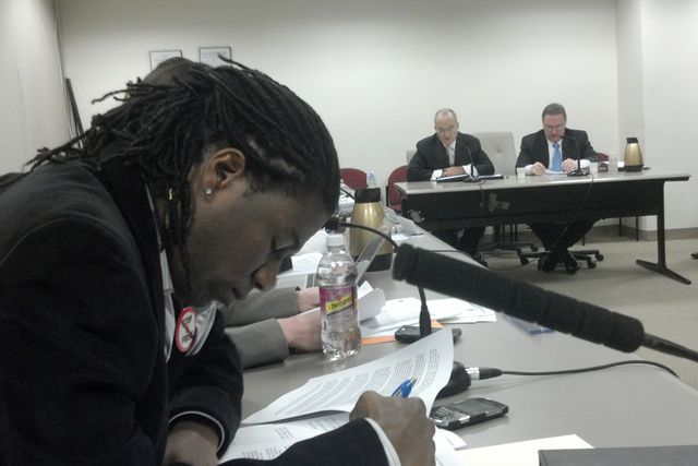 Councilmember Jumaane Williams at yesterday's budget hearing, with Ray Kelly in the background. Williams was wearing his "Stop Stop and Frisk" button at the hearing.
